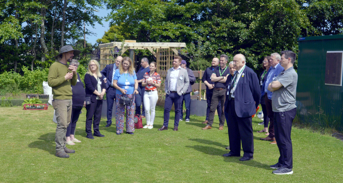 Group of people in the community garden