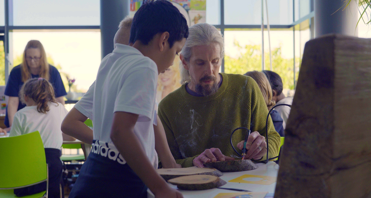 David teaching children