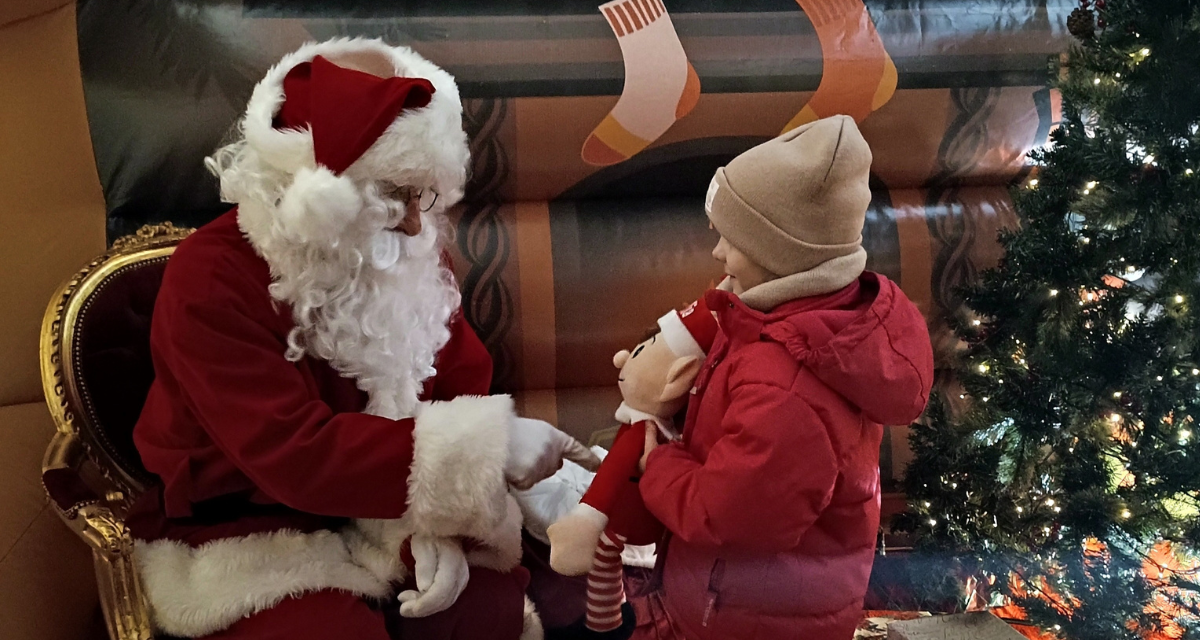 Santa speaking to child